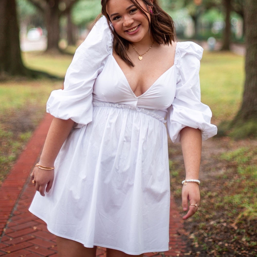 white dress with puff sleeves, size medium.